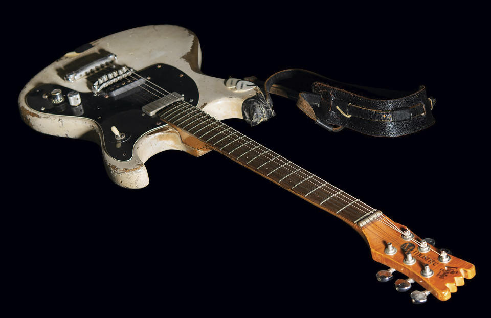 This Aug. 2021 photo, provided by Boston-based RR Auction, shows a 1965 Mosrite Ventures II electric guitar played by Johnny Ramone. The guitar sold at auction over the weekend for more than $900,000, the auctioneer said Monday, Sept. 27, 2021. Ramone, whose real name was John Cummings, bought the guitar to replace his original blue Ventures II, which was stolen, according to RR Auction. (Photo Nikki Brickett/RR Auction via AP)