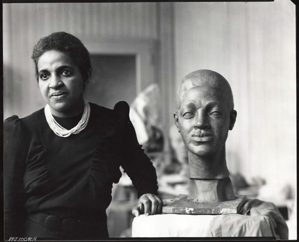 Selma Burke with one of her sculptures