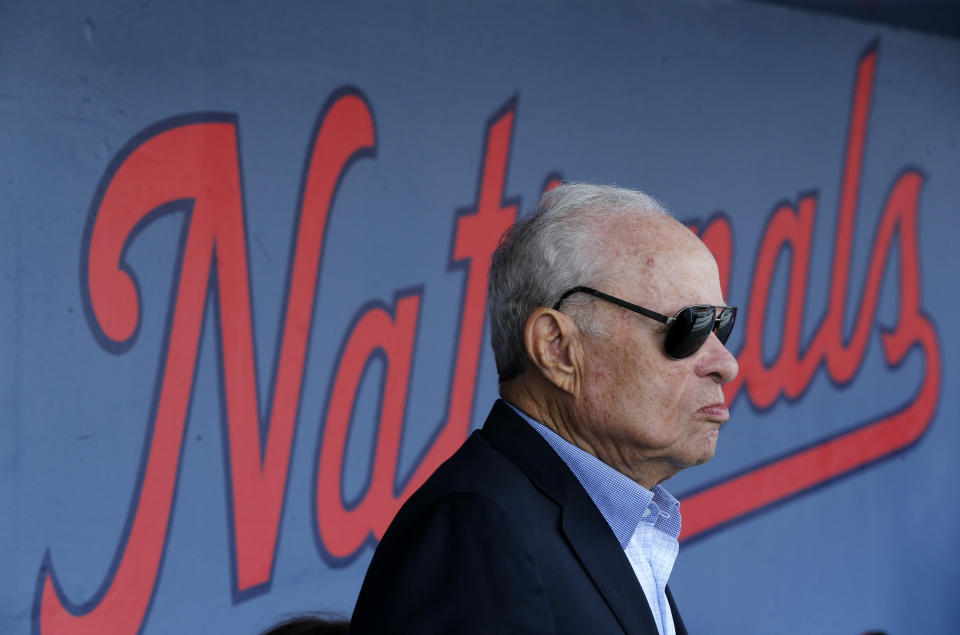 FILE - Washington Nationals owner Ted Lerner is shown in the dugout before a spring training baseball game against the Houston Astros, Feb. 28, 2017 in West Palm Beach, Fla. Washington Nationals founder Ted Lerner has died. He was 97. Lerner bought the team from Major League Baseball in 2006 for $450 million. He was managing principal owner until ceding that role to son Mark in 2018. (AP Photo/John Bazemore, file)