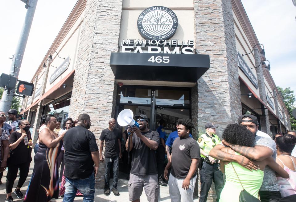 Protestors demonstrate outside New Rochelle Farms on North Ave. in New Rochelle July 7, 2023 after Raymond Fowler the father of Jarrell Garris, spoke to the media about the shooting of his son by New Rochelle police this past Monday. Garris was shot by police during a scuffle on Lincoln Ave. in which police were attempting to arrest him after an employee of the market called the police about Garris possibly stealing food.