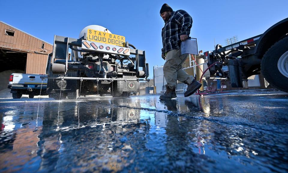 A liquid deicer truck driver heads out for a road pretreatment from the Worcester Department of Public Works & Parks on Albany Street Friday morning.