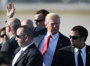 <p>President Donald Trump waves after arriving on Air Force One at the Palm Beach International Airport to spend part of the weekend at Mar-a-Lago resort on February 17, 2017 in West Palm Beach, Florida. (Joe Raedle/Getty Images) </p>