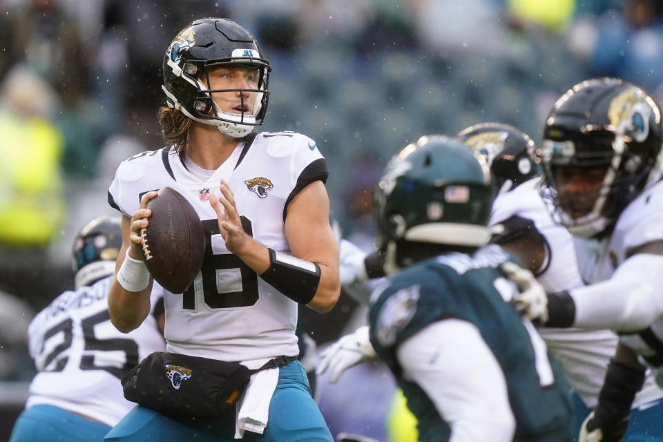 Jacksonville Jaguars' Trevor Lawrence looks to pass during the second half of an NFL football game against the Philadelphia Eagles on Sunday, Oct. 2, 2022, in Philadelphia. (AP Photo/Matt Rourke)