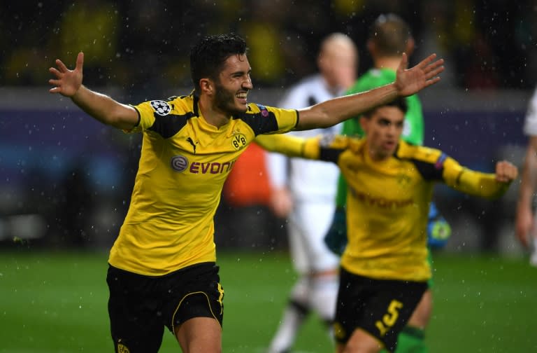 Dortmund's midfielder Nuri Sahin reacts after scoring on November 22, 2016