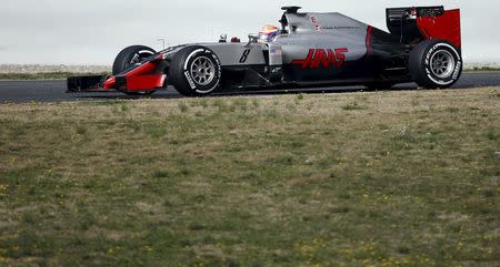 Haas driver Romain Grosjean of France takes a curve with his new VF-16 1 car during the first testing session ahead of the upcoming season at the Circuit Catalunya-Barcelona in Montmelo, Spain, February 22, 2016. REUTERS/Sergio Perez