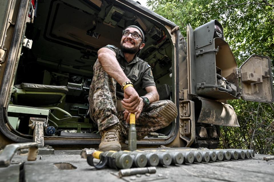 Gunner 'Molfar', 39, a Bradley IFV crew member of the 47th Magura Mechanized Brigade who took part in the fighting to liberate Robotyne village from Russian invaders, is seen inside the vehicle, Zaporizhzhia direction, southeastern Ukraine.