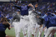 Tampa Bay Rays' Brett Phillips (35) celebrates with teammates after hitting a three-run home run against the Detroit Tigers during the 10th inning of a baseball game Friday, Sept. 17, 2021, in St. Petersburg, Fla. (AP Photo/Scott Audette)