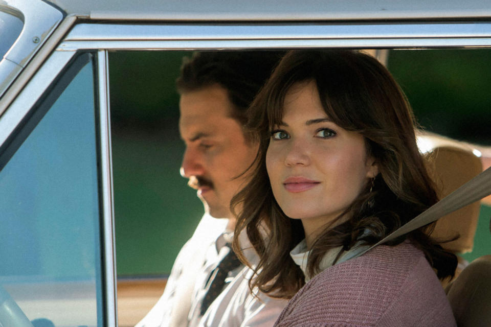 Jack Pearson and Rebecca Pearson from the TV show "This Is Us" are shown seated in a car, viewed through the open window
