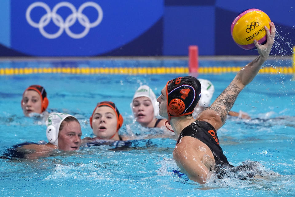 Netherland's Sabrina van der Sloot (4) shoots against South Africa during a preliminary round women's water polo match at the 2020 Summer Olympics, Friday, July 30, 2021, in Tokyo, Japan. (AP Photo/Mark Humphrey)