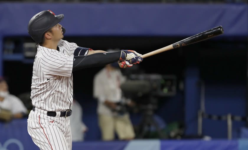 TOKYO, - AUGUST 02:Selya Suzuki from Team Japan hits a home run.