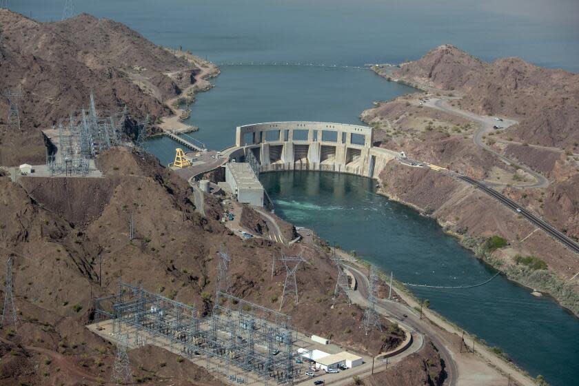 LAKE HAVASU, CA - APRIL 04: Parker Dam spans the Colorado River between Arizona and California and creates Lake Havasu on Tuesday, April 4, 2023 in Lake Havasu, CA. Parker Dam provides a reservoir from which water is pumped to the Colorado River Aqueduct. It is also the deepest dam in the world; 73 percent of its structural height of 320 feet is below the original riverbed. (Brian van der Brug / Los Angeles Times)