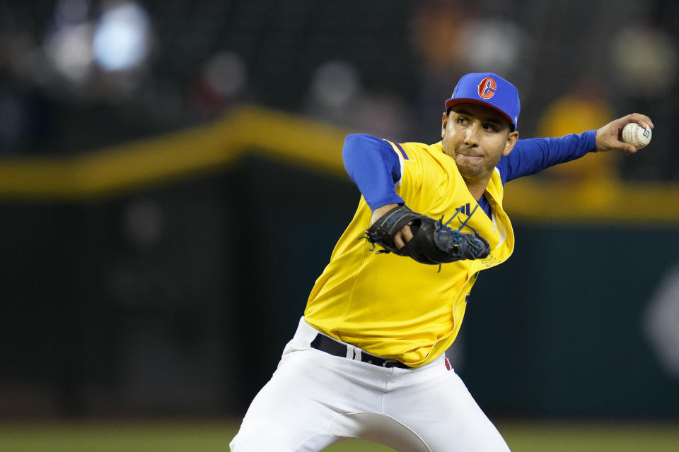 Colombia pitcher Rio Gomez throws against Canada during the sixth inning of a World Baseball Classic game in Phoenix, Tuesday, March 14, 2023. (AP Photo/Godofredo A. Vásquez)