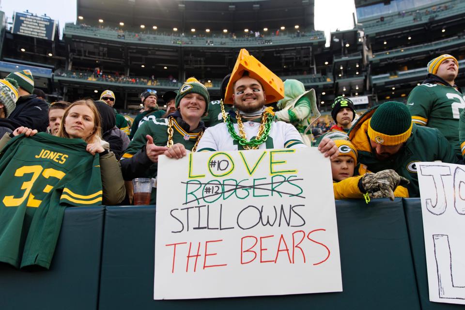 A Green Bay Packers fan holds up a sign supporting quarterback Jordan Love during warmups prior to the game against the Chicago Bears on Jan. 7 at Lambeau Field.