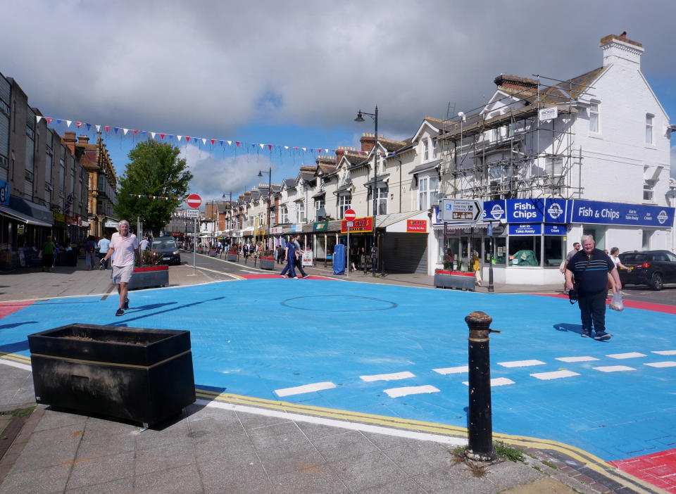 The council painted part of the seaside resort's famous 'golden mile' bright blue. (SWNS)