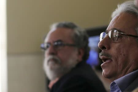 President of Oswaldo Cruz Foundation Paulo Gadelha (R) and Wilson Savino, Director of the Oswaldo Cruz Institute attend a news conference in Rio de Janeiro, Brazil, February 5, 2016. REUTERS/Ricardo Moraes