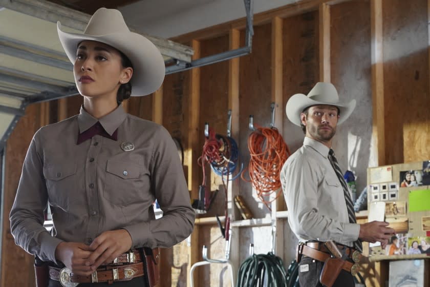 Walker -- The CW TV Series, Walker -- "Don't Fence Me In" -- Image Number: WLK104a_0117r -- Pictured (L-R): Lindsey Morgan as Micki Ramirez and Jared Padalecki as Cordell Walker -- Photo: Rebecca Brenneman/The CW -- © 2021 The CW Network, LLC. All Rights Reserved. Lindsey Morgan and Jared Padalecki in "Walker" on The CW.