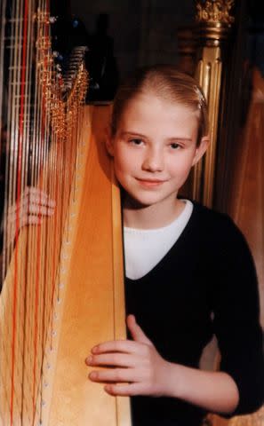 <p>George Frey/Getty</p> Elizabeth Smart at 14-years-old