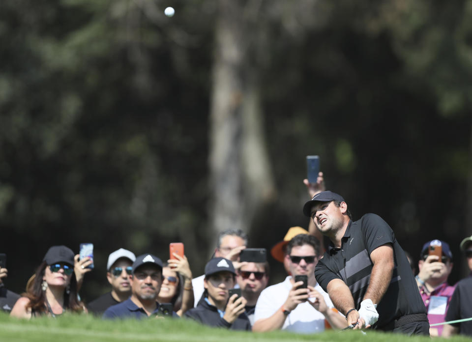 Patrick Reed of United States approaches to the third green during the final round for the WGC-Mexico Championship golf tournament, at the Chapultepec Golf Club in Mexico City, Sunday, Feb. 23, 2020.(AP Photo/Fernando Llano)