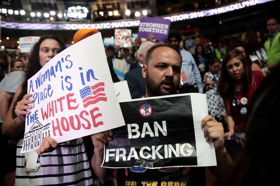 An anti-fracking protestor demonstrates at the 2016 Democratic National Convention, July 27, 2016.