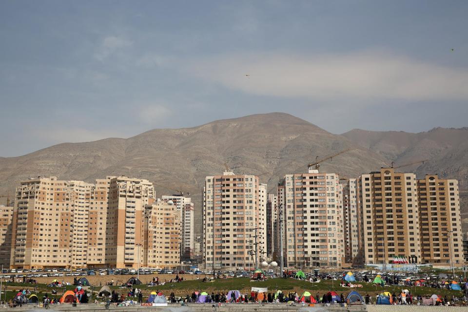 Iranians spend time outdoors observing the ancient festival of Sizdeh Bedar, an annual public picnic day on the 13th day of the Iranian new year, west of Tehran, Iran, Wednesday, April 2, 2014. Sizdeh Bedar, which comes from the Farsi words for “thirteen” and “day out,” is a legacy from Iran’s pre-Islamic past that hard-liners in the Islamic Republic never managed to erase from calendars. State media and calendar makers choose to call the festival “Nature Day” instead of Sizdeh Bedar, given the bad-luck associations with the number 13. (AP Photo/Ebrahim Noroozi)