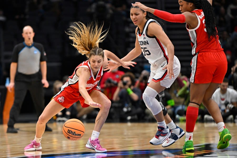 SEATTLE, WASHINGTON – MARCH 25: Jacy Sheldon #4 of the Ohio State Buckeyes and Azzi Fudd #35 of the UConn Huskies battle for the ball during the second quarter in the Sweet 16 round of the NCAA Women’s Basketball Tournament at Climate Pledge Arena on March 25, 2023 in Seattle, Washington. (Photo by Alika Jenner/Getty Images)