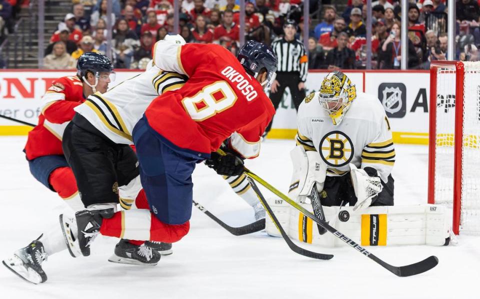 Boston Bruins goaltender Jeremy Swayman (1) blocks a shot by Florida Panthers right wing Kyle Okposo (8) in the second period of Game 1 of the second-round series of the Stanley Cup Playoffs on Monday, May 6, 2024, in Sunrise, Fla.
