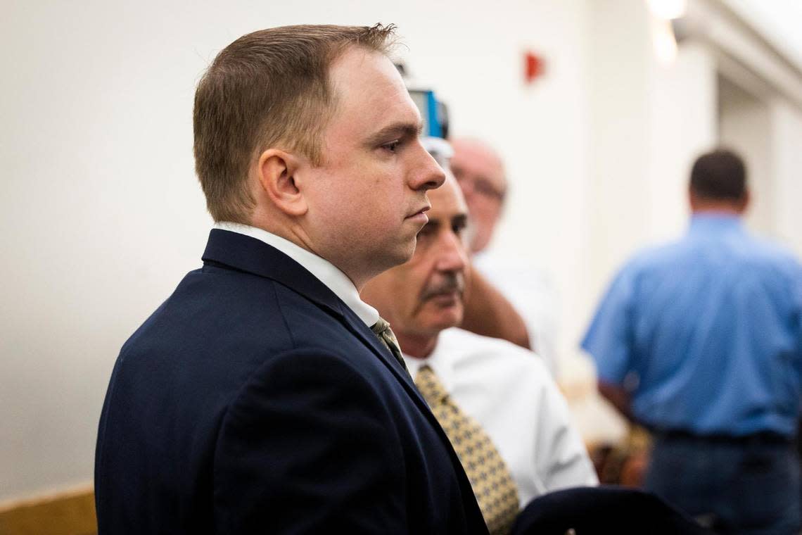 Aaron Dean walks into the courtroom for a recusal hearing on Judge David Hagerman’s status in the case Thursday, June 23, 2022, in Fort Worth.