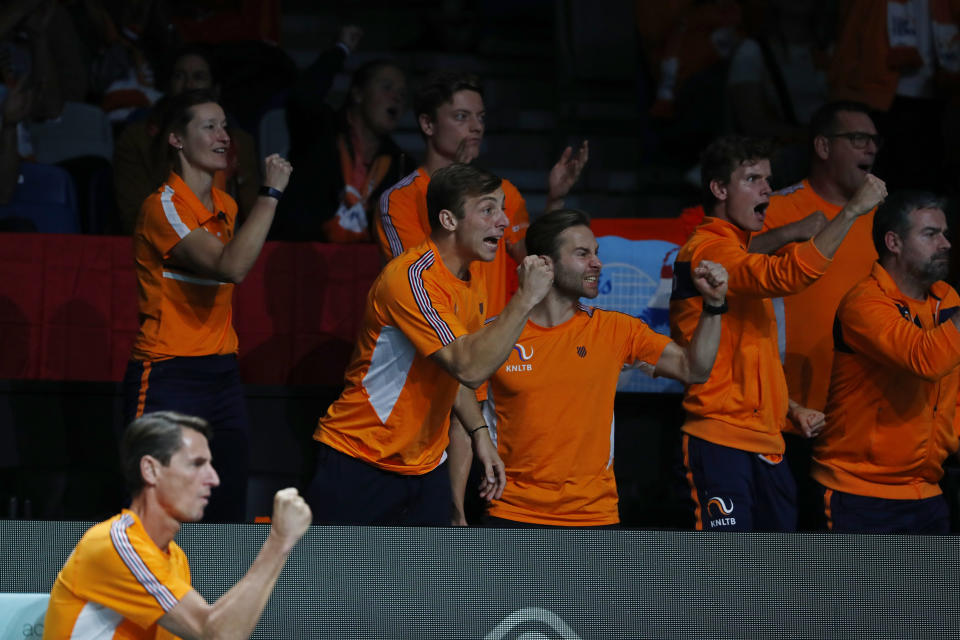 Netherlands fans cheers behind team Captain Paul Haarhuis during a Davis Cup quarter-final tennis match between Australia and The Netherlands in Malaga, Spain, Tuesday, Nov. 22, 2022. (AP Photo/Joan Monfort)