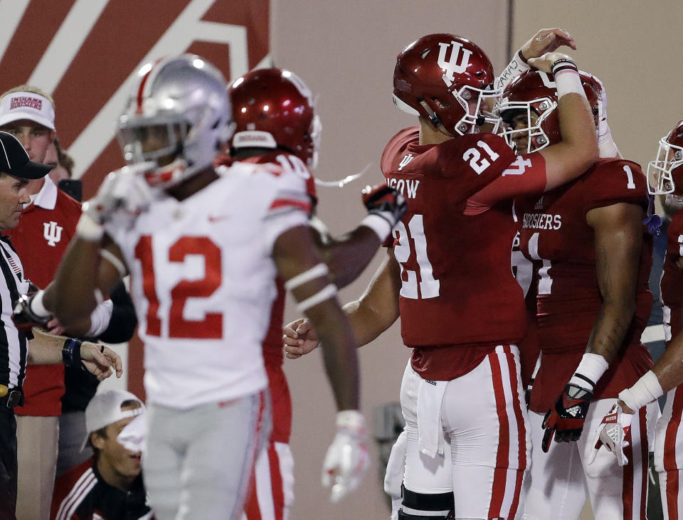 Indiana quarterback Richard Lagow (21) celebrates an 8-yard touchdown reception by wide receiver Simmie Cobbs Jr. (1) during the first half against Ohio State. (AP Photo/Darron Cummings)