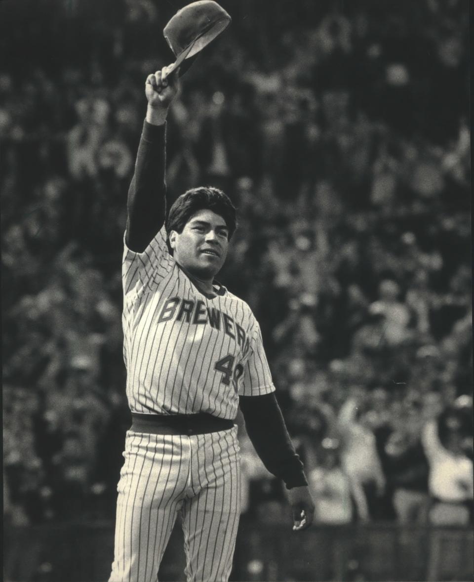 Teddy Higuera tips his cap to the County Stadium fans after pitching a complete game in 1987.