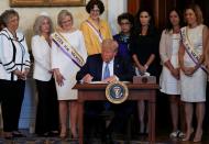 FILE PHOTO: U.S. President Trump hosts signing ceremony marking 100th anniversary of 19th Amendment ratification at the White House in Washington