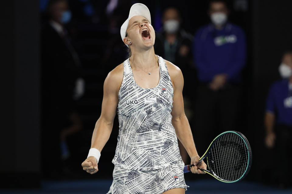 Ash Barty of Australia celebrates after defeating Danielle Collins of the U.S. in the women's singles final at the Australian Open tennis championships in Saturday, Jan. 29, 2022, in Melbourne, Australia. (AP Photo/Hamish Blair)