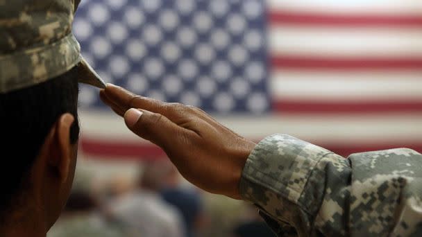 PHOTO: A soldier salutes the flag during a welcome home ceremony for troops arriving from Afghanistan in this June 15, 2011 file photo to Fort Carson, Colo. (John Moore/Getty Images, FILE)