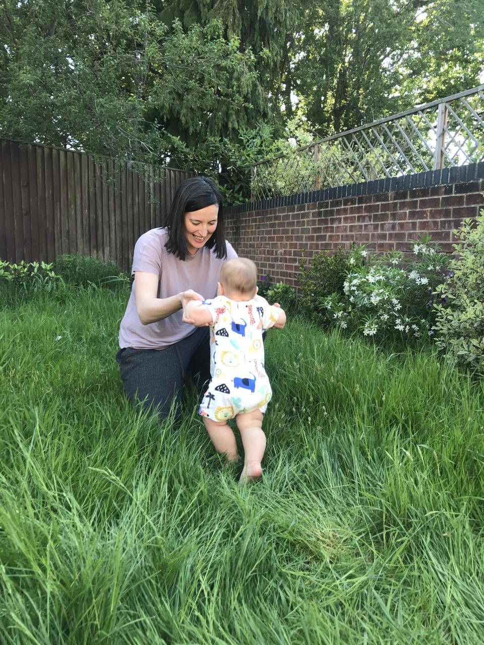 Beth Lewis playing with her daughter