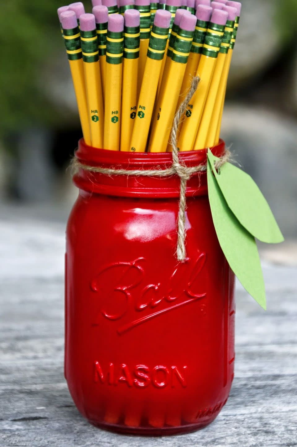 <p>Use it as a pencil holder, or a catch-all for things like paper clips and thumb tacks. These also make great <a href="http://www.goodhousekeeping.com/holidays/gift-ideas/g1432/teacher-gifts/" rel="nofollow noopener" target="_blank" data-ylk="slk:teacher gifts;elm:context_link;itc:0;sec:content-canvas" class="link ">teacher gifts</a>. </p><p><em><a href="http://www.tillysnest.com/2014/08/down-home-blog-hopnumber-94-apple-mason.html" rel="nofollow noopener" target="_blank" data-ylk="slk:Get the tutorial at Tilly's Nest »;elm:context_link;itc:0;sec:content-canvas" class="link ">Get the tutorial at Tilly's Nest »</a></em></p>