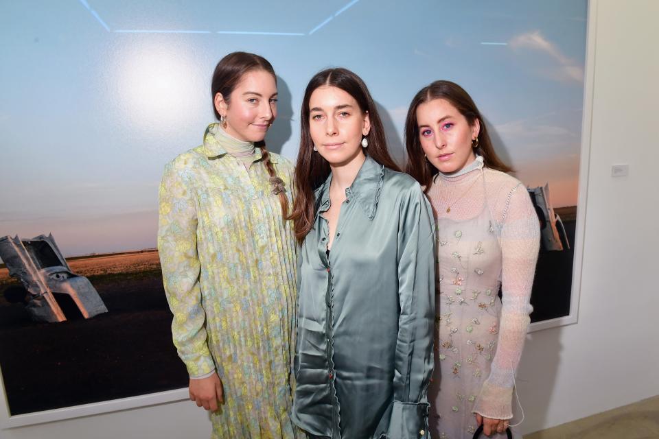 The rock trio Haim will return to Firefly Friday, Sept 23. 2022. The band of sisters (featuring Danielle Haim, Este Haim and Alana Haim) are pictured at an exhibition hosted by Acne Studios at Galerie Edouard Escougnou in Paris, Franceon on Sept. 28, 2018.
