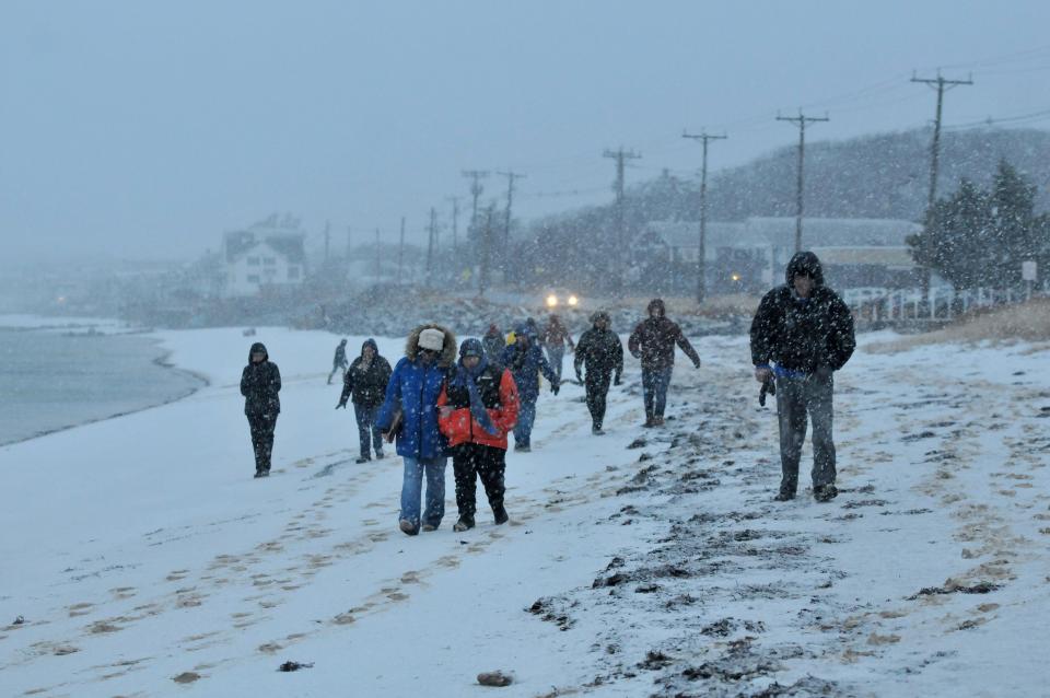 Heavy slushy snow didn't stop the 41st Re-Rooters Day ceremony on Sunday afternoon in Provincetown.