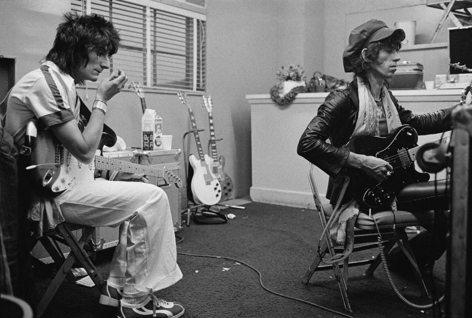 <p>Ronnie Wood and Keith Richards backstage during the group's 1975 Tour of the Americas.</p>
