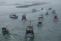 Several dozen fishing boats flying Taiwanese national flags set out from the Suao harbor, northeastern Taiwan, to the disputed islands in the East China Sea, Monday, Sept. 24, 2012. The islands, called Senkaku in Japan and Diaoyu in China, are controlled by Japan but also claimed by China and Taiwan, and have been a key part of simmering regional tensions over rival territorial claims. (AP Photo/Wally Santana)