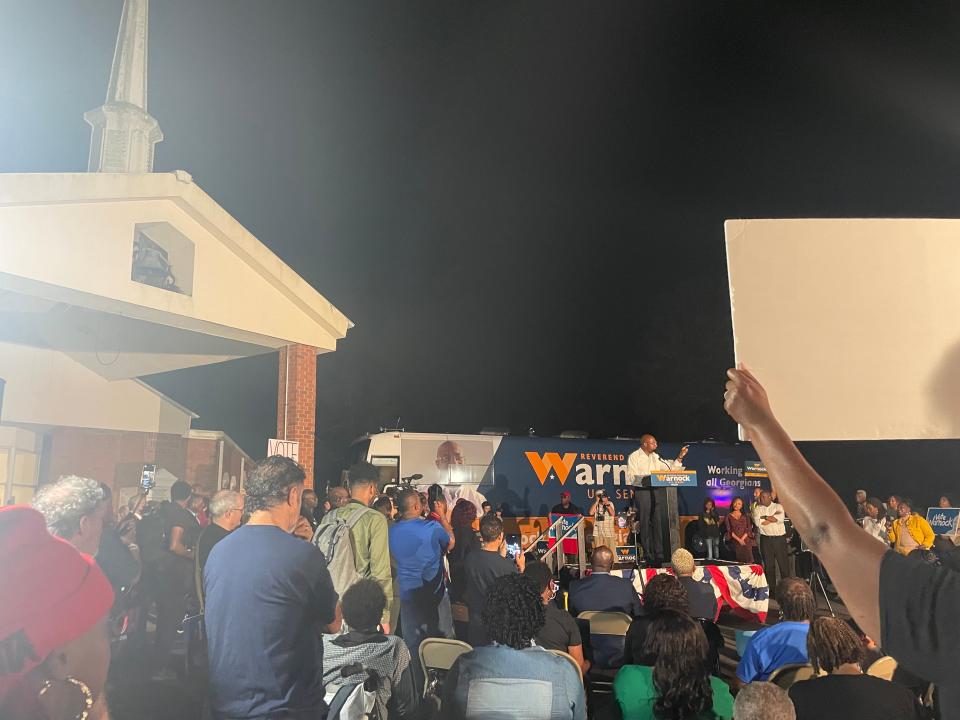 Sen. Raphael Warnock talks to the crowd at a rally in Savannah outside of Bethel A.M.E. Baptist Church.