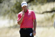 Richard Bland reacts to his chip shot onto the sixth green in the second round of the Dell Technologies Match Play Championship golf tournament, Thursday, March 24, 2022, in Austin, Texas. (AP Photo/Tony Gutierrez)