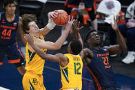 Baylor's Matthew Mayer (24) takes the rebound away from Illinois' Kofi Cockburn (21) as Butler's Jared Butler (12) watches during the second half of an NCAA college basketball game Wednesday, Dec. 2, 2020, in Indianapolis. (AP Photo/Darron Cummings)