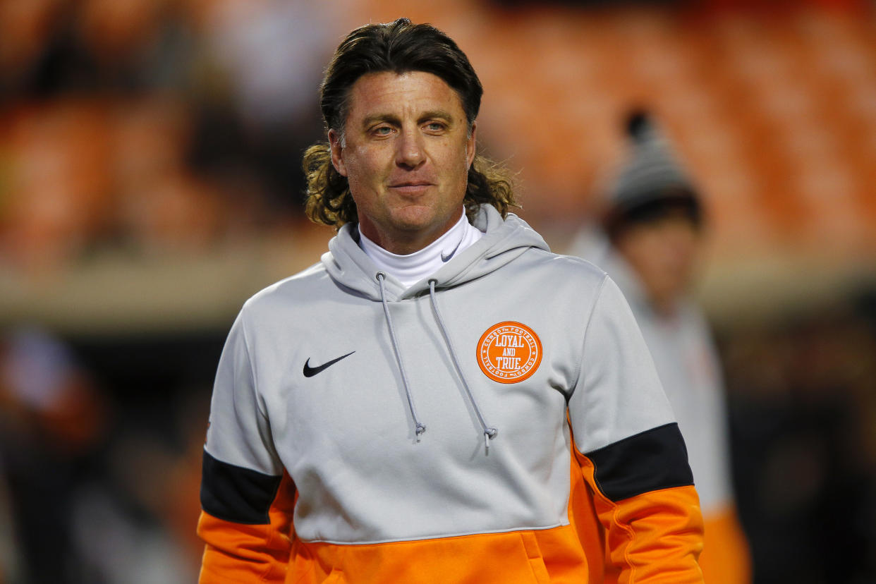 STILLWATER, OK - NOVEMBER 30:  Head coach Mike Gundy of the Oklahoma State Cowboys grins before Bedlam against of the Oklahoma Sooners on November 30, 2019 at Boone Pickens Stadium in Stillwater, Oklahoma.  OU won 34-16.  (Photo by Brian Bahr/Getty Images)