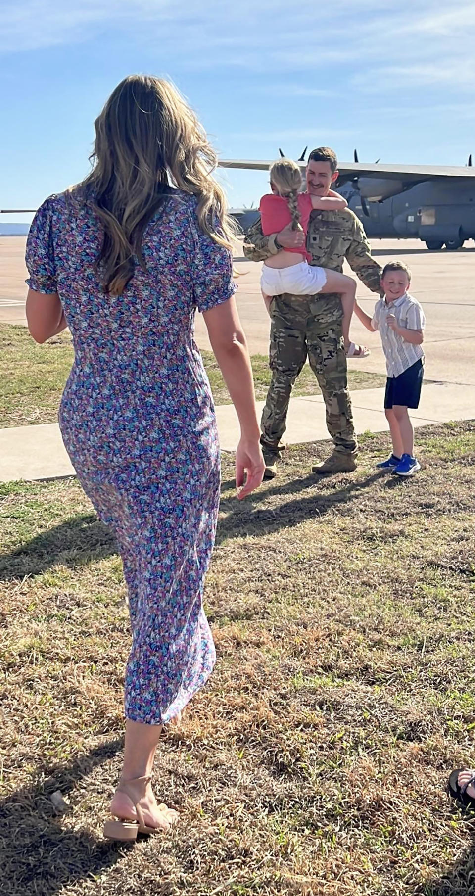 Lt. Col. Nate Clegg reunites with his family following a deployment.  (Courtesy Maxine Clegg)