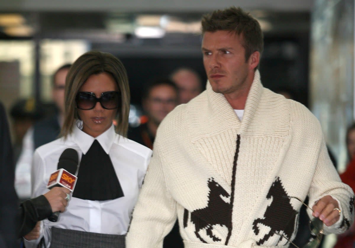 Sweater weather: Posh and Becks out on the town in Rome in 2006 (Getty)