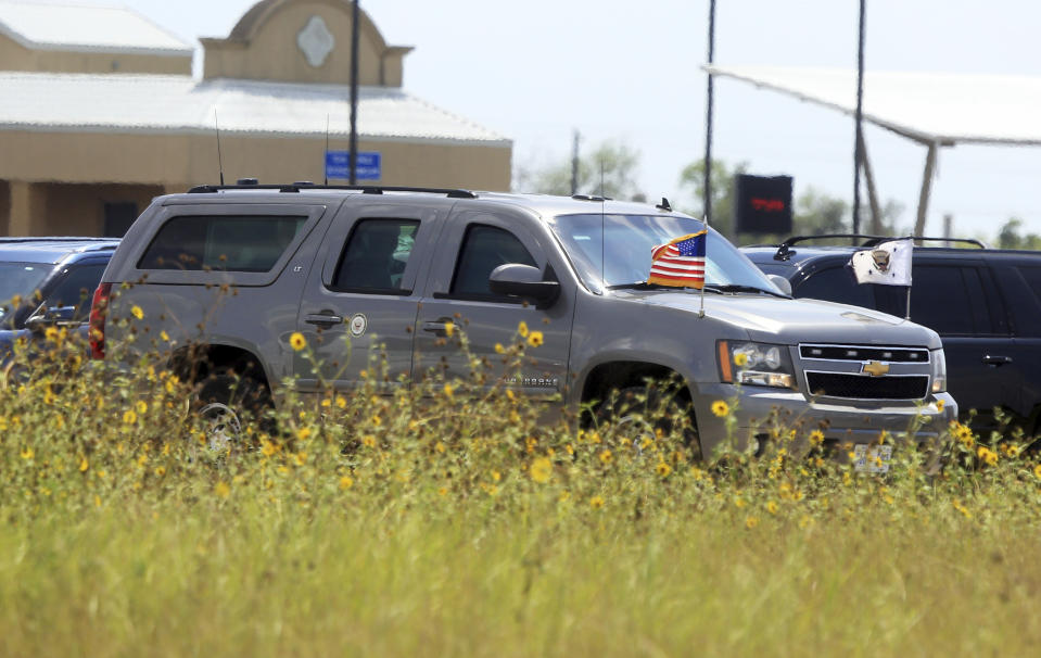 US Vice President Mike Pence leaves the migrant tent city in Donna, Texas Friday, July 12, 2019. Pence and eight GOP lawmakers toured the border station in Donna (Joel Martinez/The Monitor via AP)