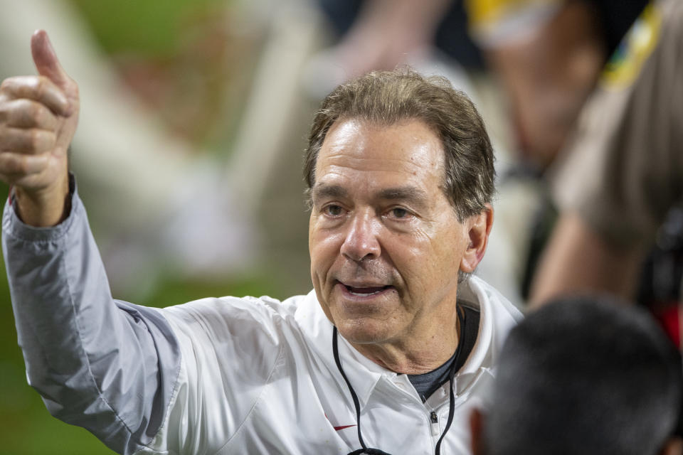 MIAMI GARDENS, FL - JANUARY 11: Alabama Crimson Tide head coach Nick Saban smiles and gives a thumbs up to the fans in the stands after the Alabama Crimson Tide defeated the Ohio State Buckeyes at the College Football Playoff National Championship football on January 11, 2021 at the Hard Rock Stadium in Miami Gardens, FL. (Photo by Doug Murray/Icon Sportswire via Getty Images)