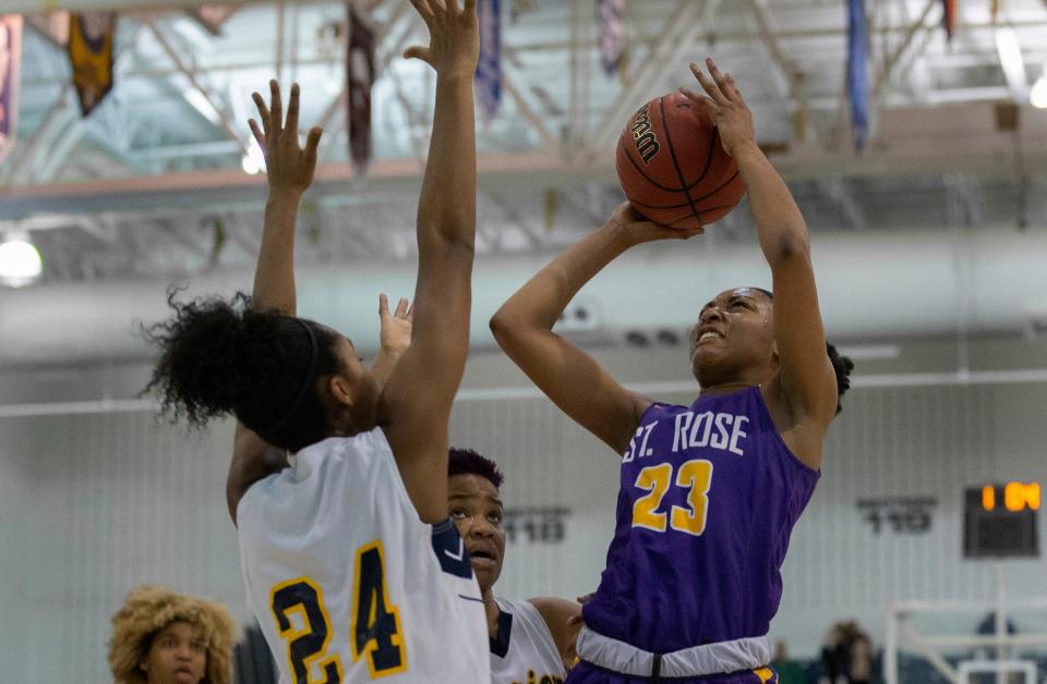 Makayla Andrews, St Rose goes up with shot againts Christina Midgette, Franklin. St Rose Girls Basketball vs Franklin High School in NJSIAA Tournament of Champions Semifinal in Toms River on March 14, 2019. 