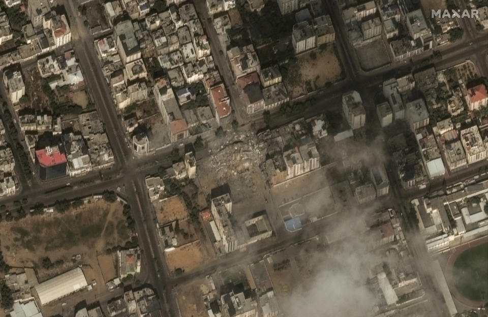 This image provided by Maxar Technologies, shows the destroyed Watan Tower in Gaza, Tuesday Oct. 10, 2023. (Satellite image ©2023 Maxar Technologies via AP)