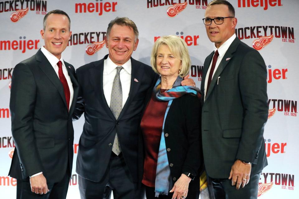 Christopher Ilitch, left, Ken Holland, Marian Ilitch and new Detroit Red Wings GM Steve Yzerman pose for a photo following a news conference on Friday, April 19, 2019, at Little Caesars Arena in Detroit.